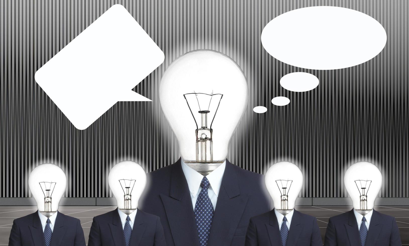 businessman  and lamp-head with thought bubble photo