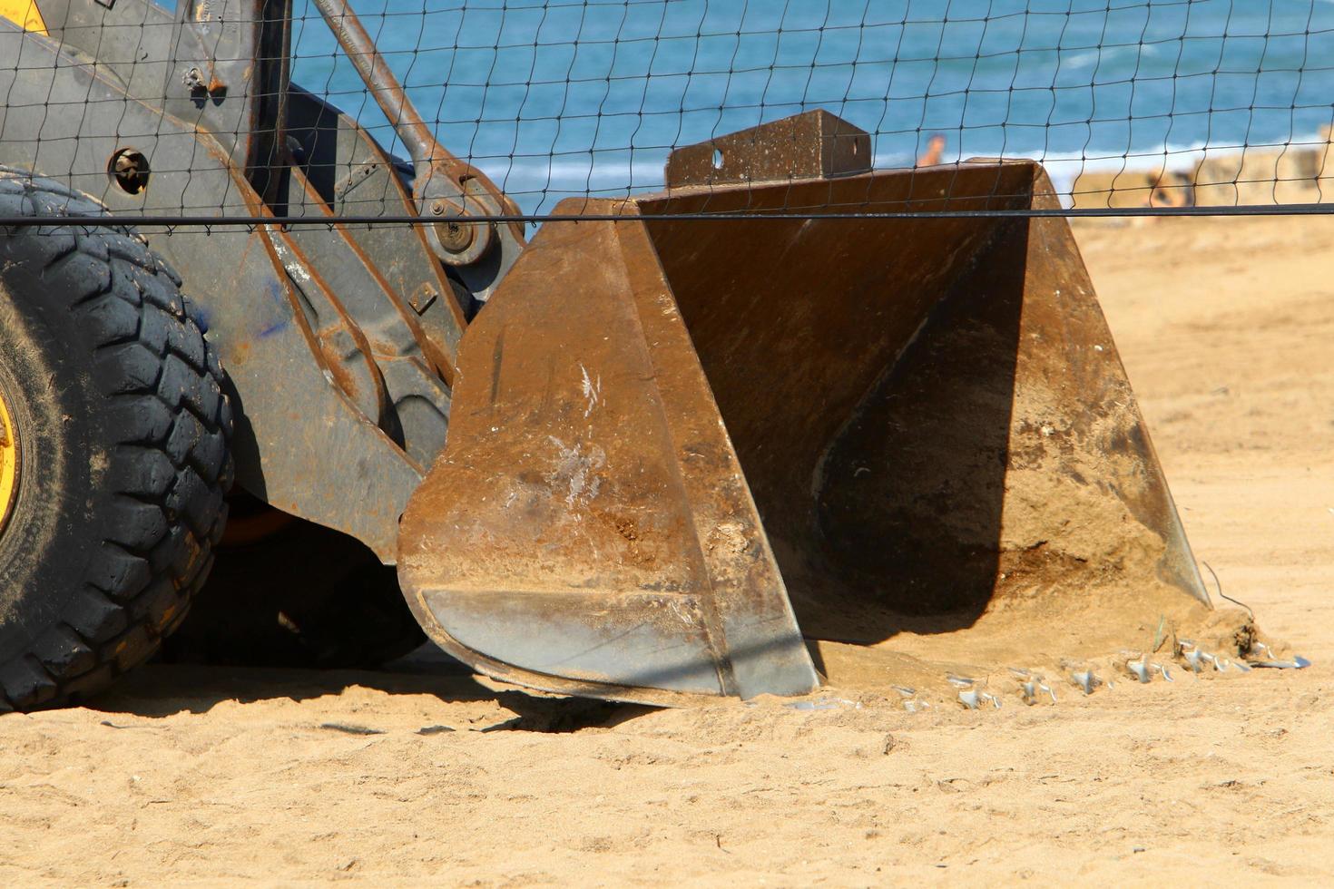Nahariya Israel March 4, 2020. A large excavator is working at a construction site. photo