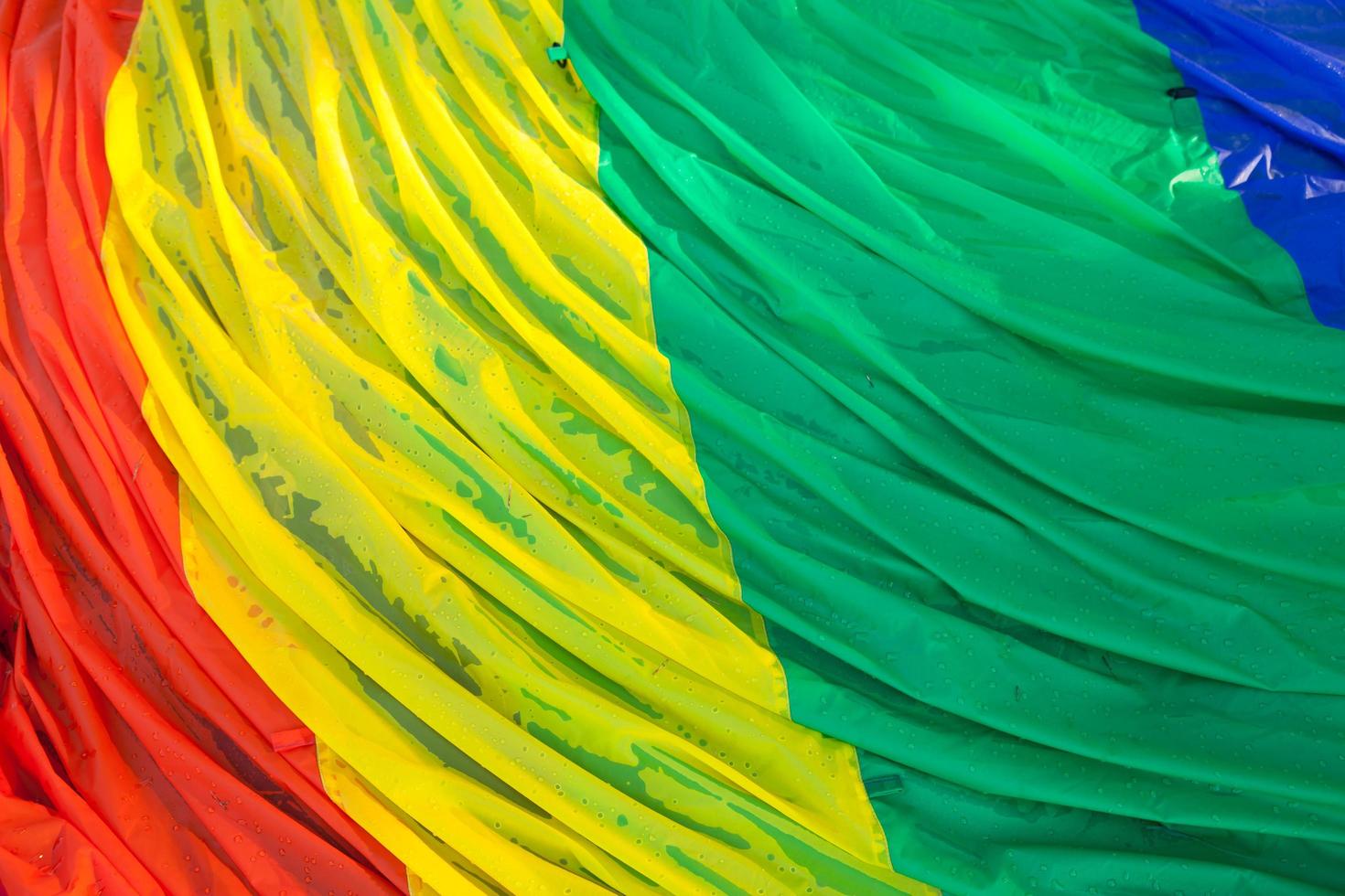 Abstract color background of closeup into balloon and water dorp photo