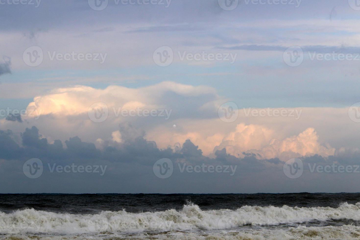 Clouds in the sky over the Mediterranean Sea. photo