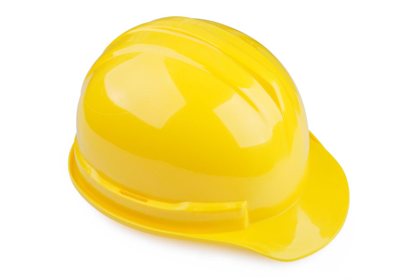 Yellow safety helmet on white background photo