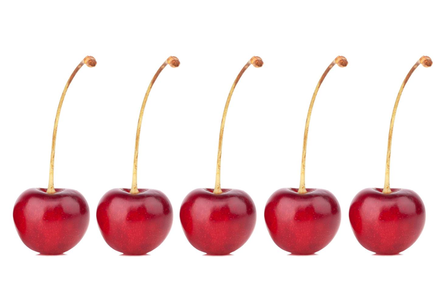 Sweet cherry on white background photo