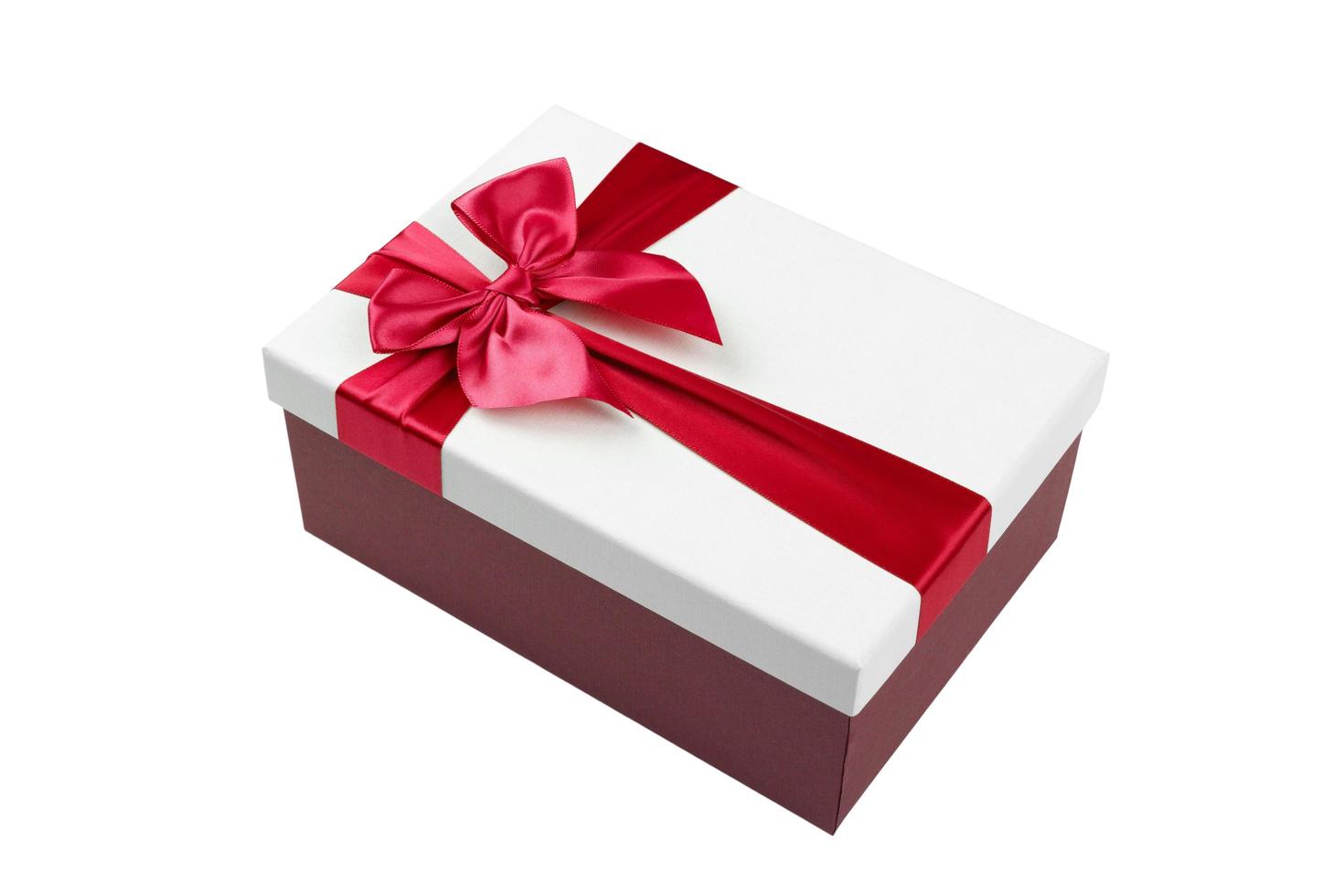 White gift Box with red ribbon Isolated on white background photo