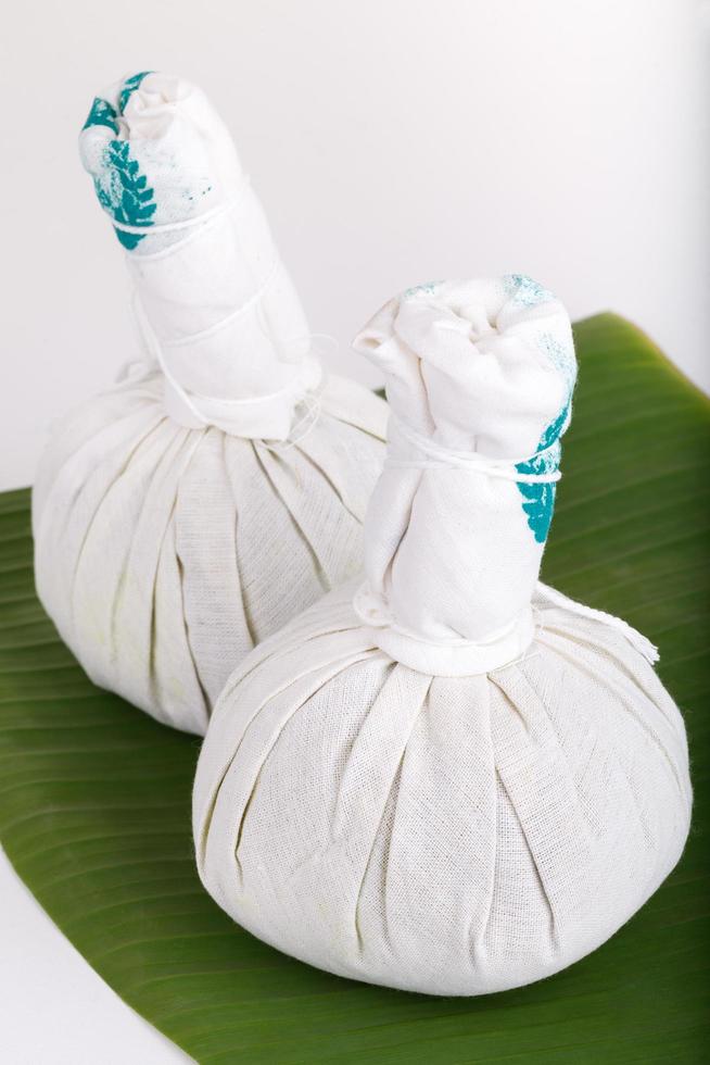 Herbal compress balls for spa treatment photo