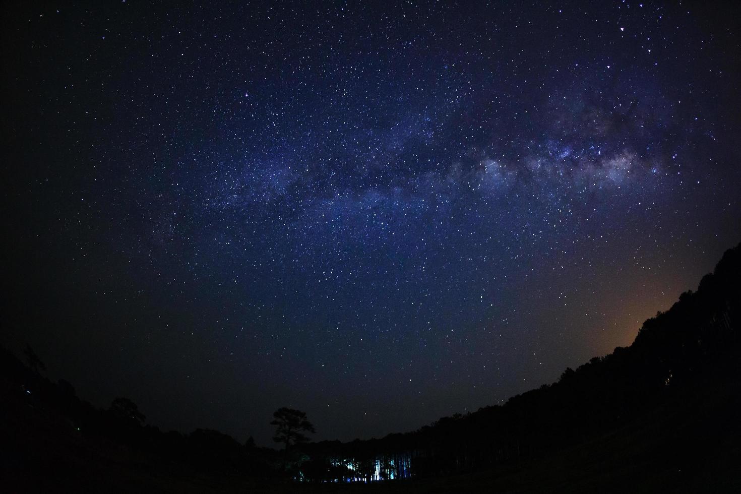 Milky way galaxy with stars and space dust in the universe, Long exposure photograph, with grain. photo