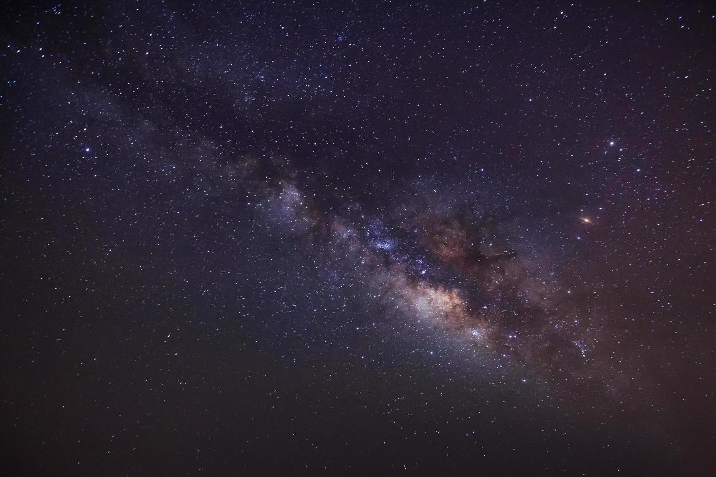 Milky way night scene,Long exposure photograph, with grain photo