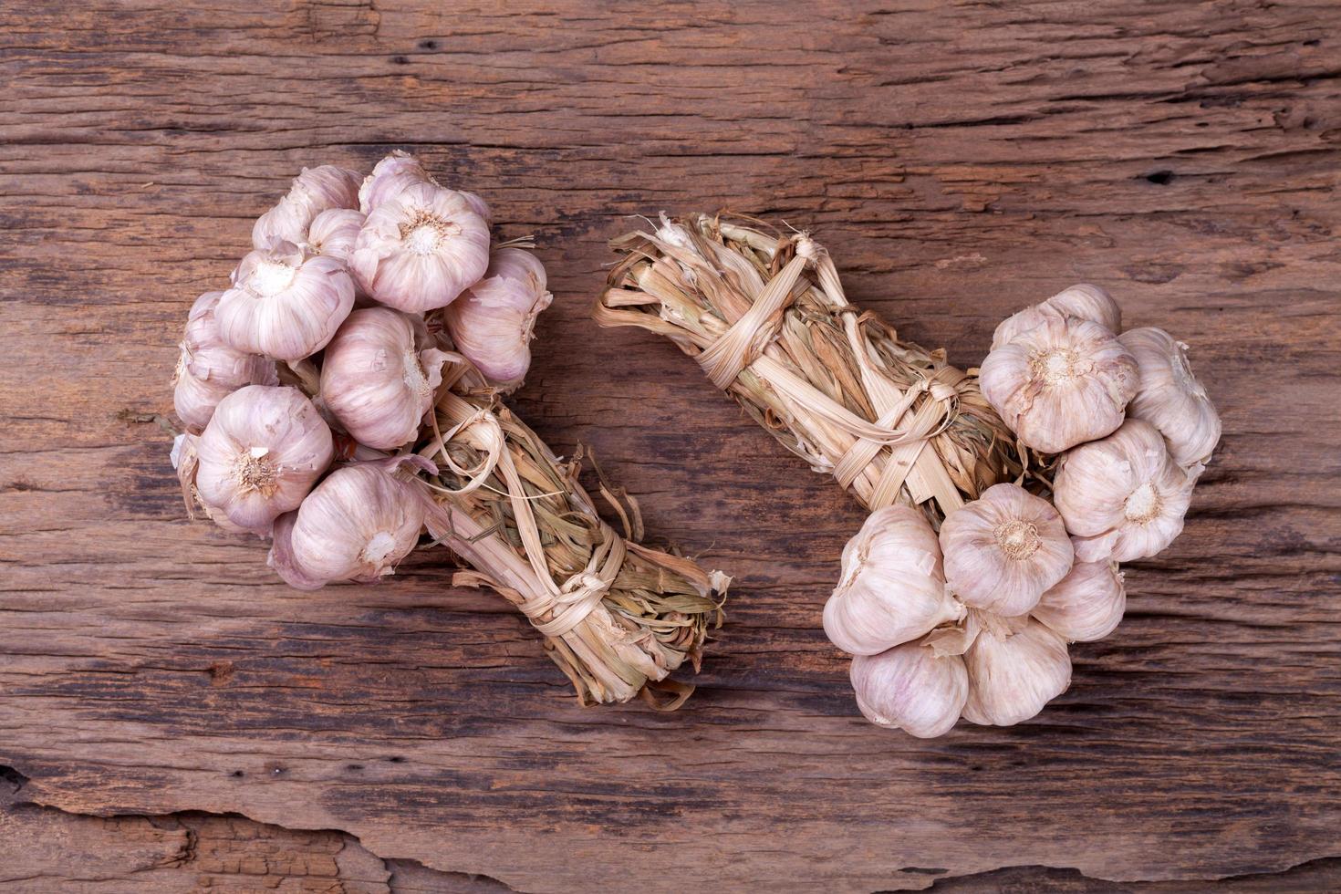 garlic on wooden background photo