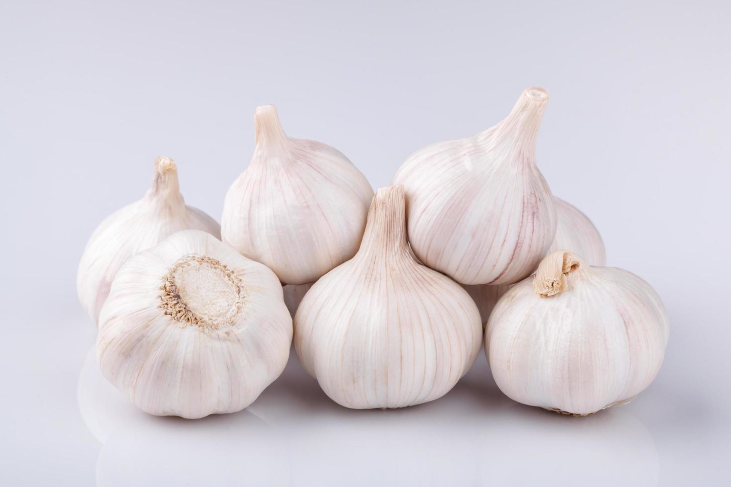 Fresh garlic on white background photo