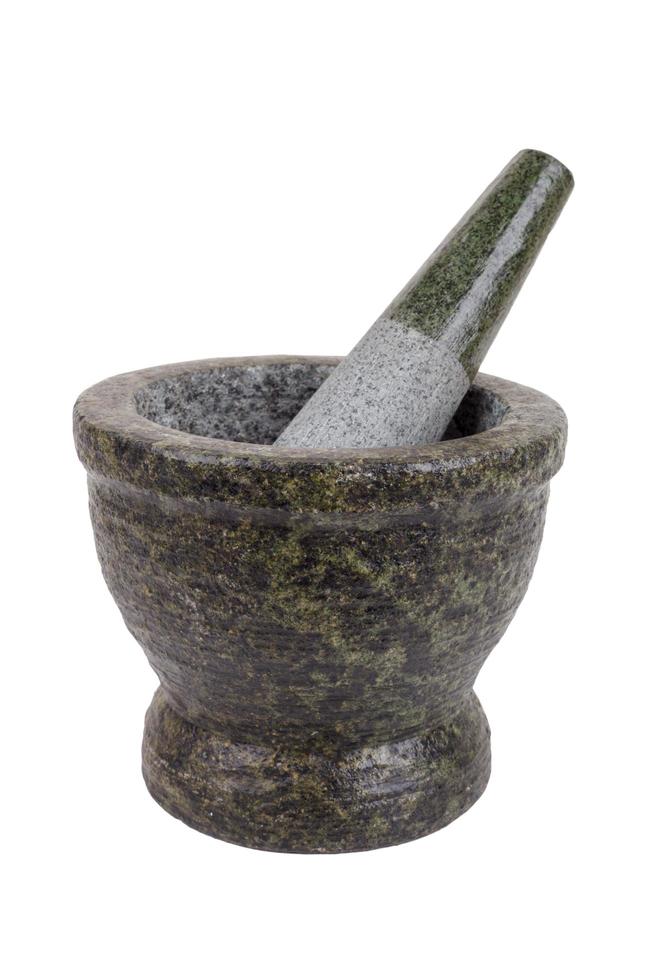 rock mortar and pestle on white background photo