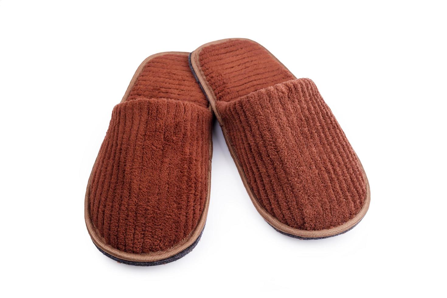 Brown wool slipper isolated on white background photo