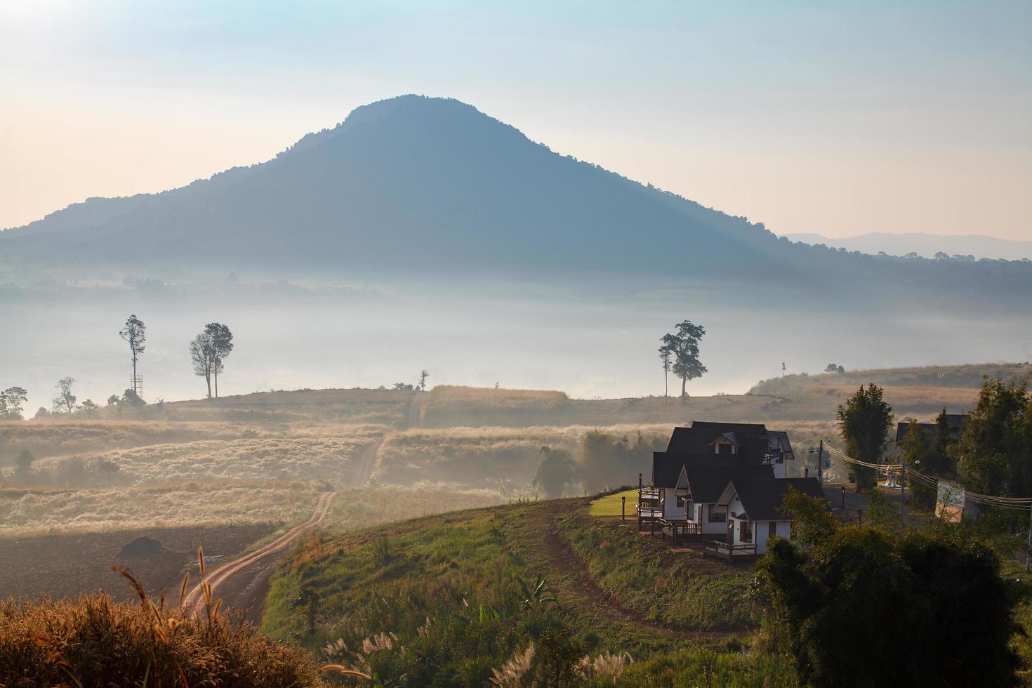 Misty morning sunrise and house in Khao Takhian Ngo View Point at Khao-kho Phetchabun,Thailand photo