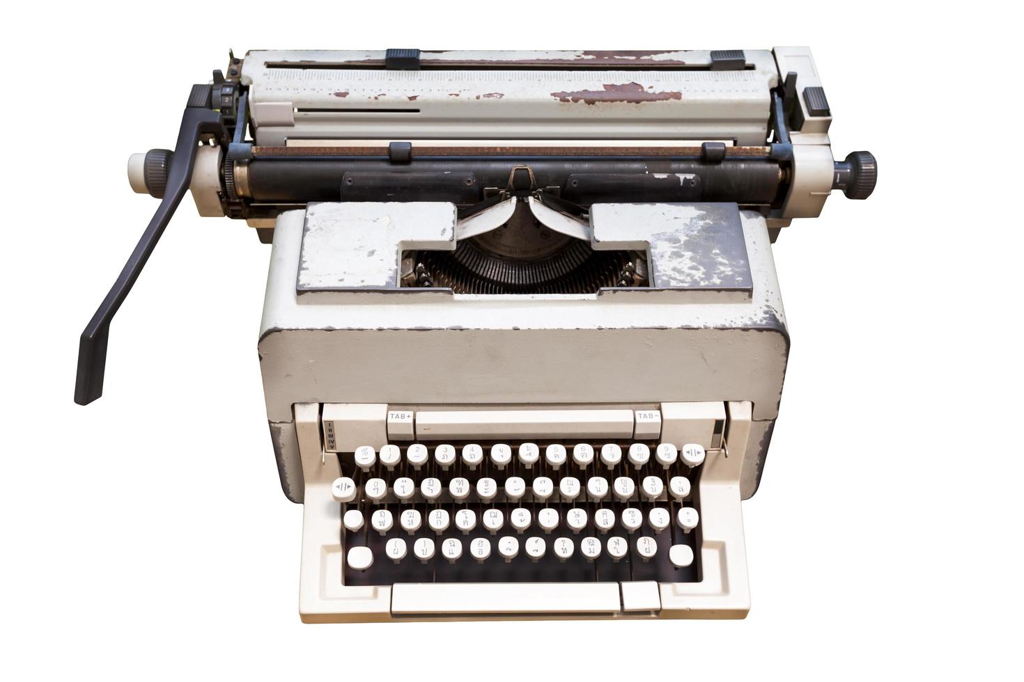 Old thai typewriter isolate on white background photo