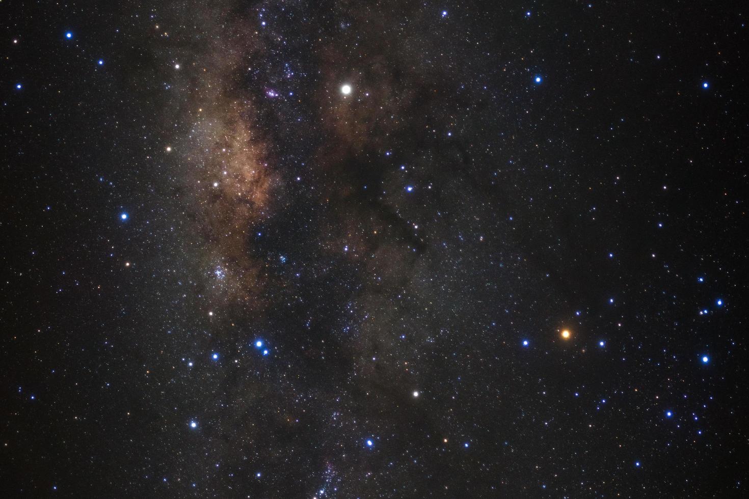 Close-up of Milky way galaxy with stars and space dust in the universe, Long exposure photograph, with grain. photo