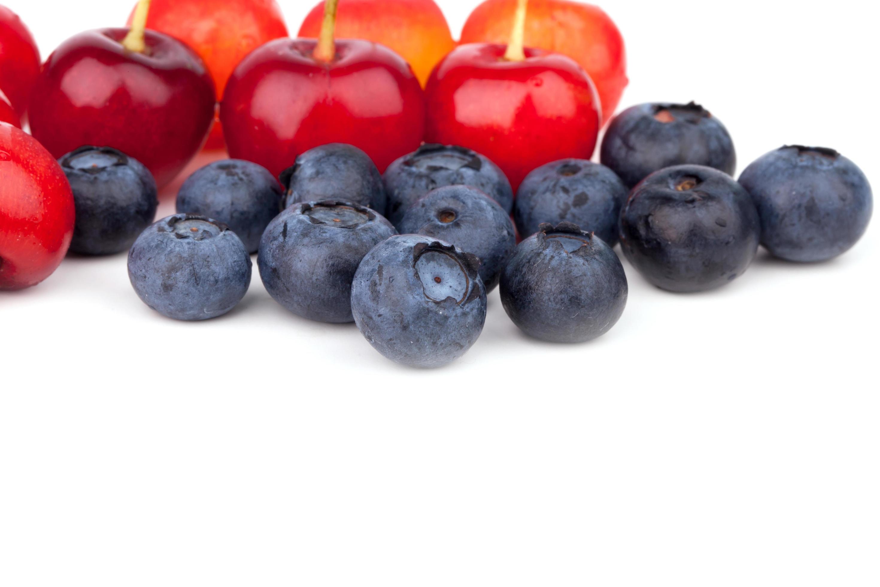 Close up Sweet Cherries and blueberries 11042105 Stock Photo at Vecteezy