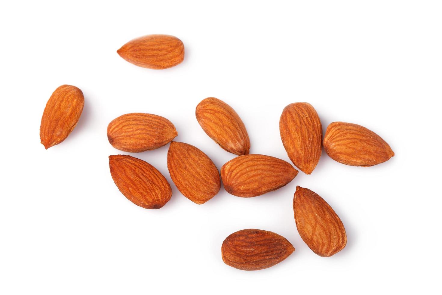 almond nuts isolated on white background photo