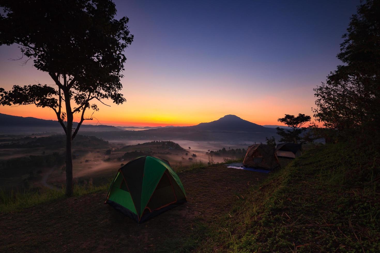 Misty morning sunrise in Khao Takhian Ngo View Point at Khao-kho Phetchabun,Thailand photo