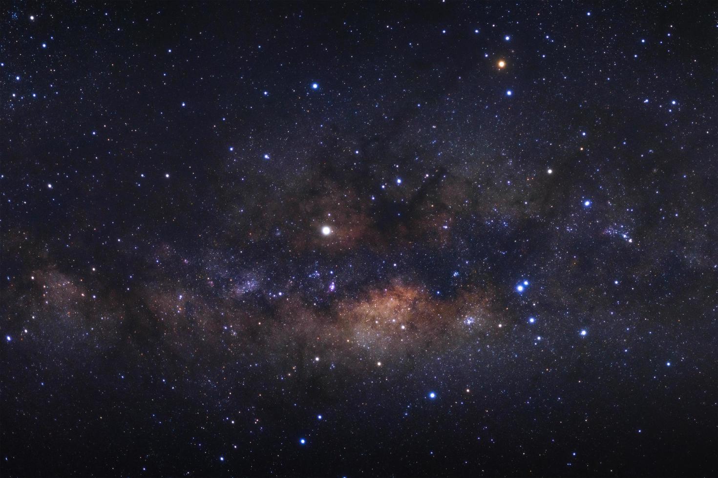 Milky way galaxy with stars and space dust in the universe, Long exposure photograph, with grain. photo