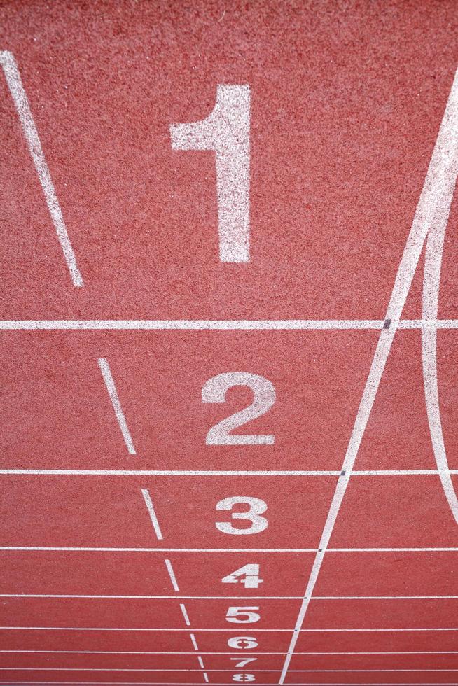 Numbers on running track photo