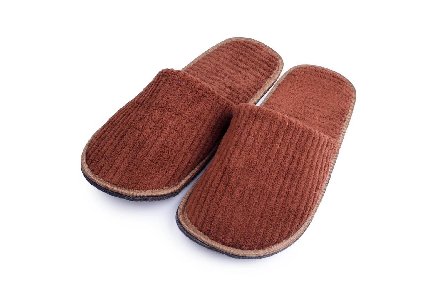 Brown wool slipper isolated on white background photo