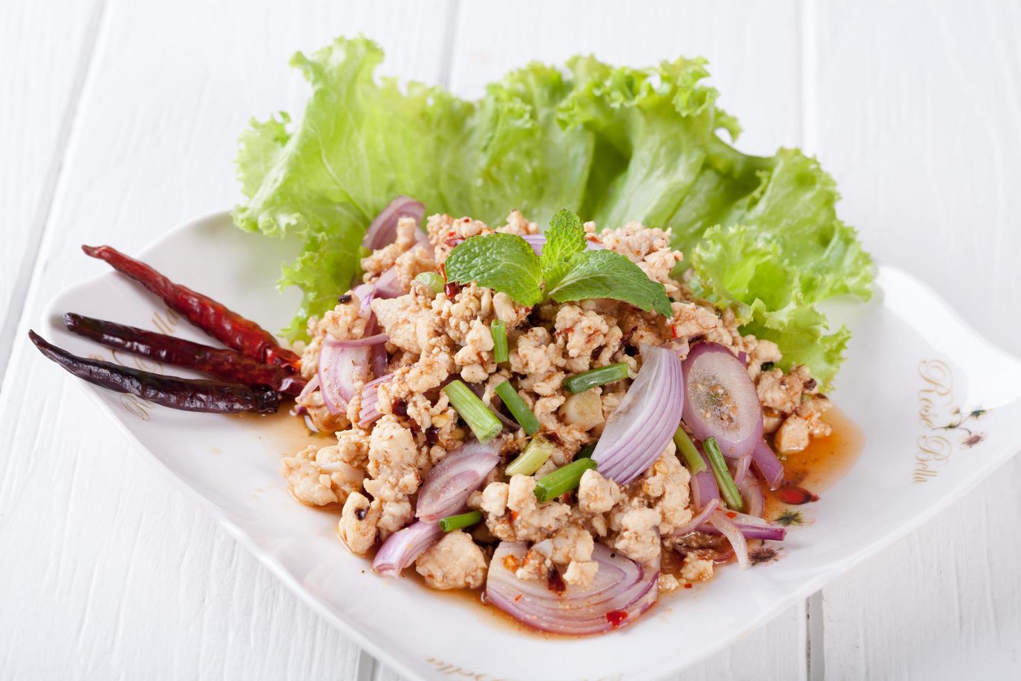 Spicy minced pork salad , Thai food photo