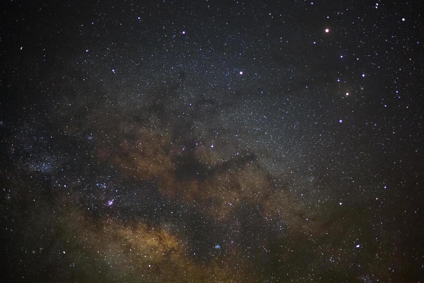 The center of milky way galaxy. Long exposure photograph.with grain photo