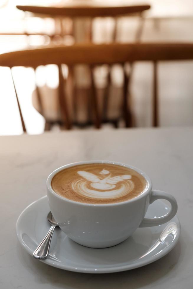 coffee-latte-art-in-coffee-shop-in-vintage-color-filter-11043437-stock