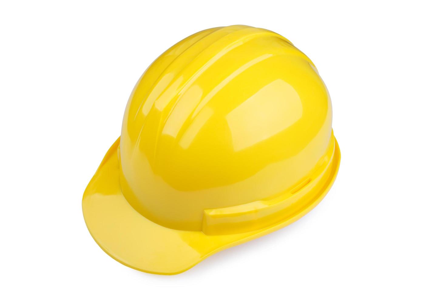 Yellow safety helmet on white background photo
