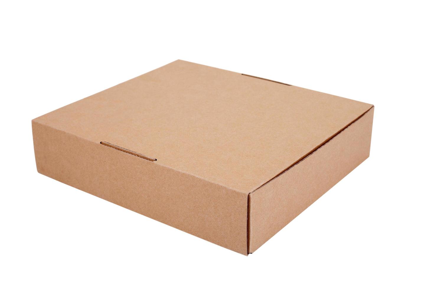 Blank cardboard box isolated on white photo