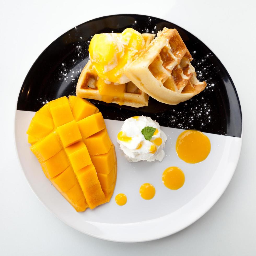 waffles with ice cream and mango photo