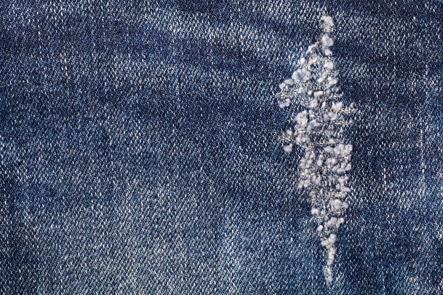 torn old blue jeans use as background 11044029 Stock Photo at Vecteezy