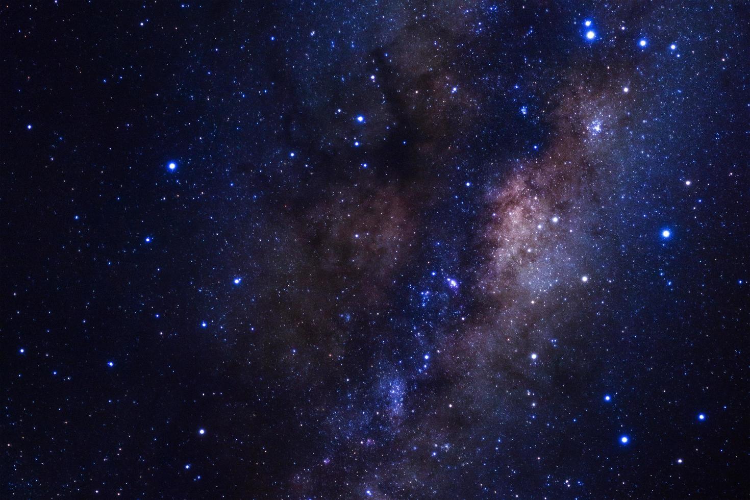 Milky way galaxy with stars and space dust in the universe, Long exposure photograph, with grain. photo