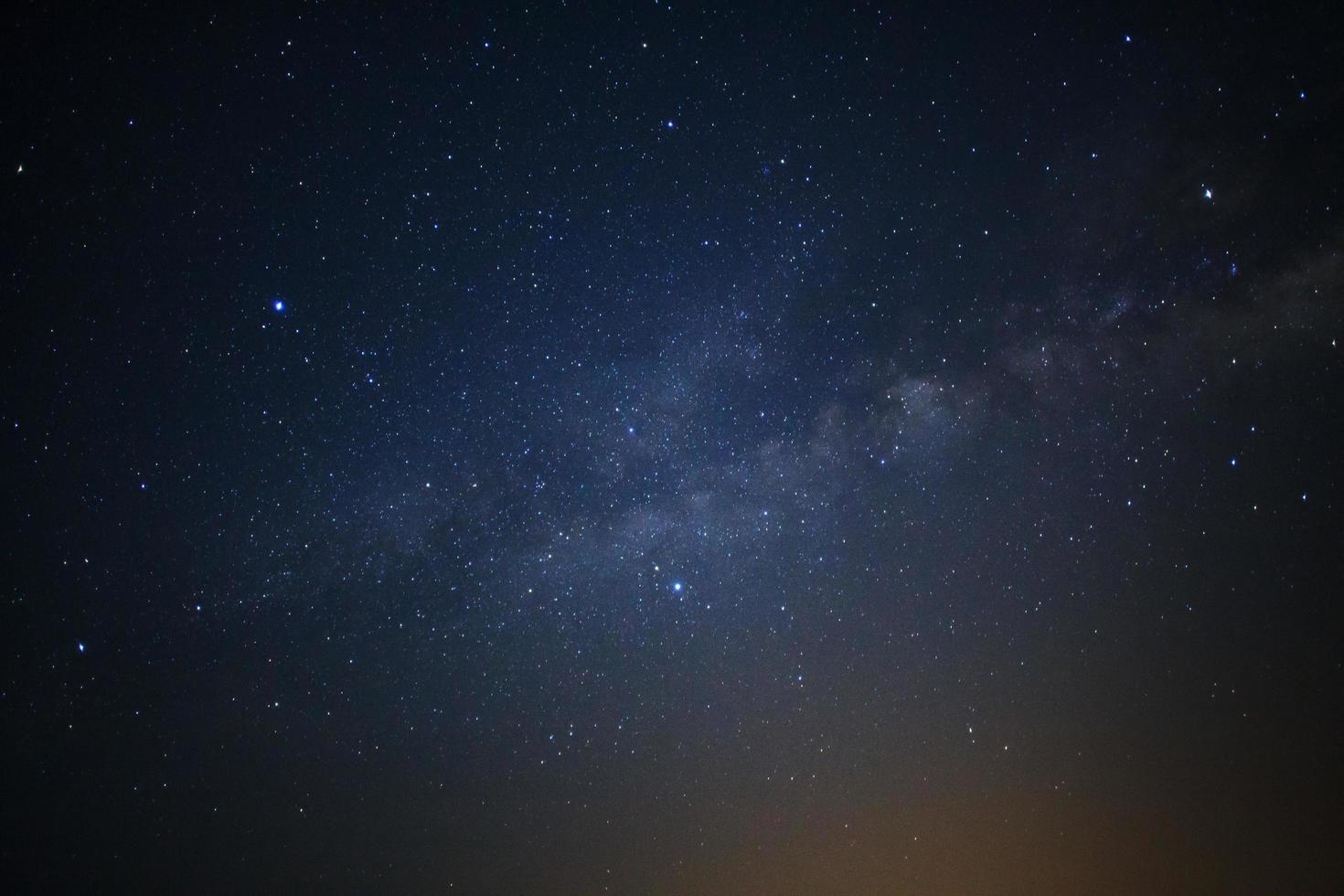 milkyway galaxy with stars and space dust in the universe photo