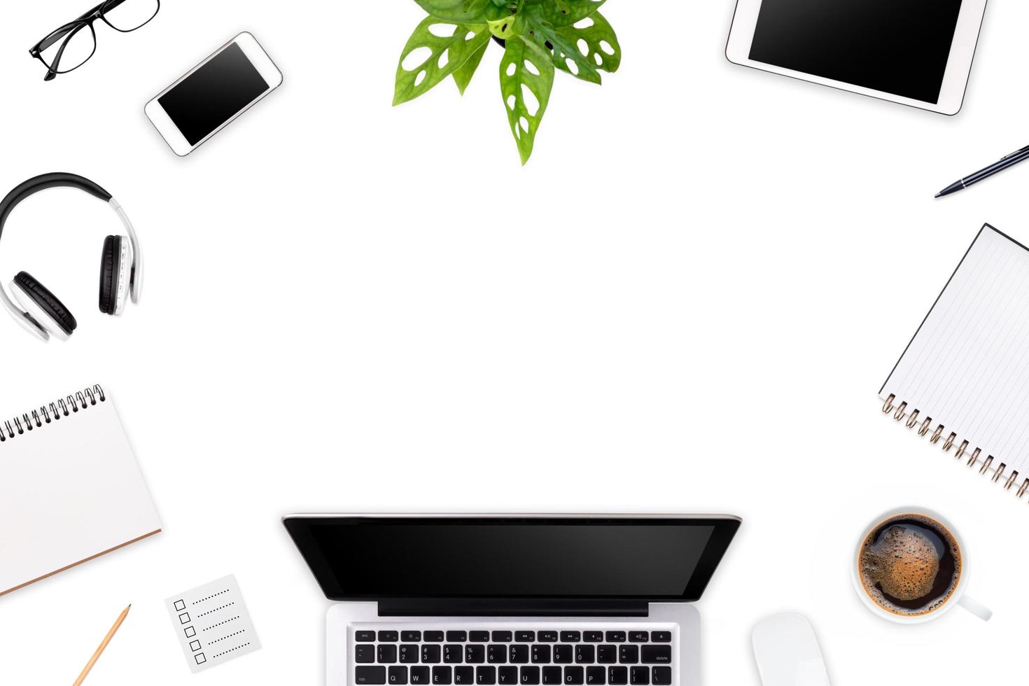 Modern workspace with laptop tablet, smartphone and coffee cup copy space on color background. Top view. Flat lay style. photo