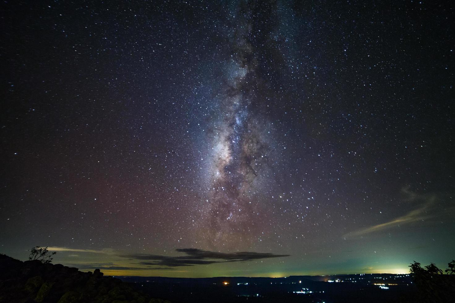 Milky way galaxy at knob stone ground is name Lan Hin Pum viewpoint at Phu Hin Rong Kla National Park in Phitsanulok, Thailand photo