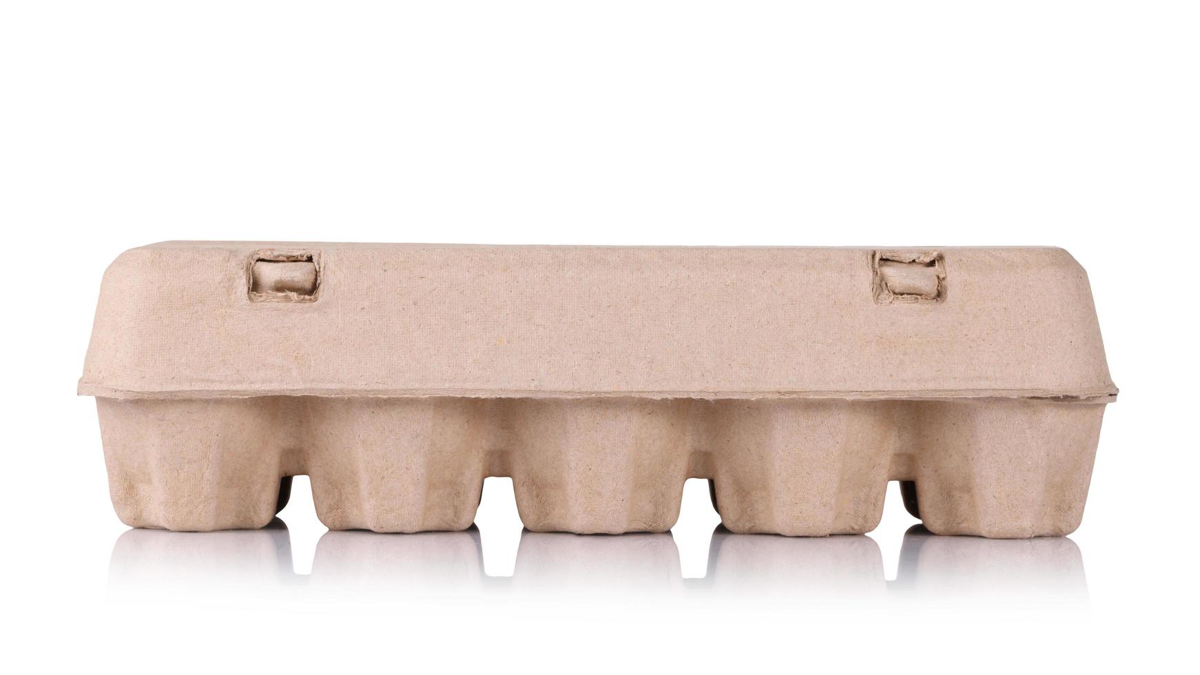 eggs in an egg carton on a white background photo