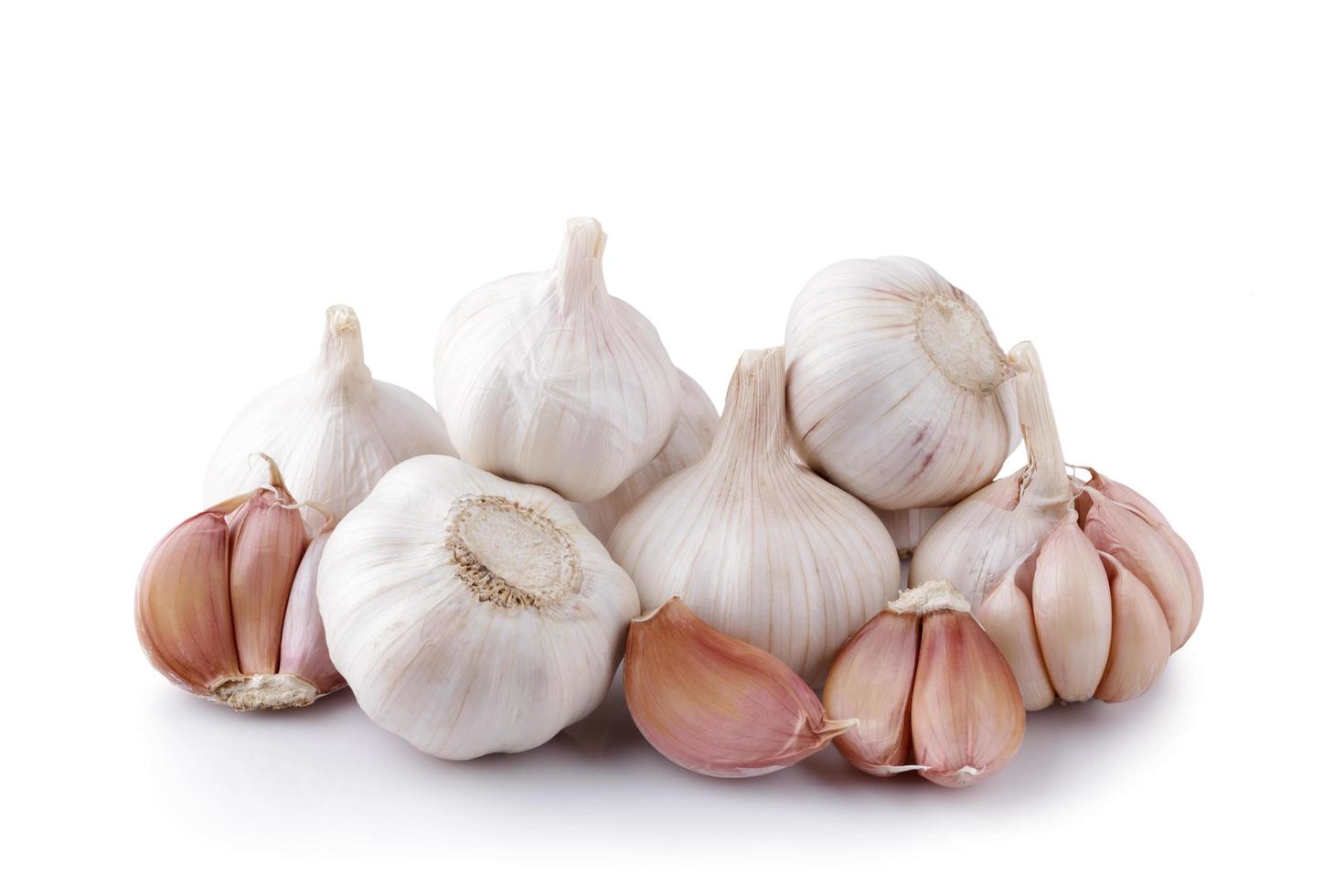 Fresh garlic isolated on white background photo