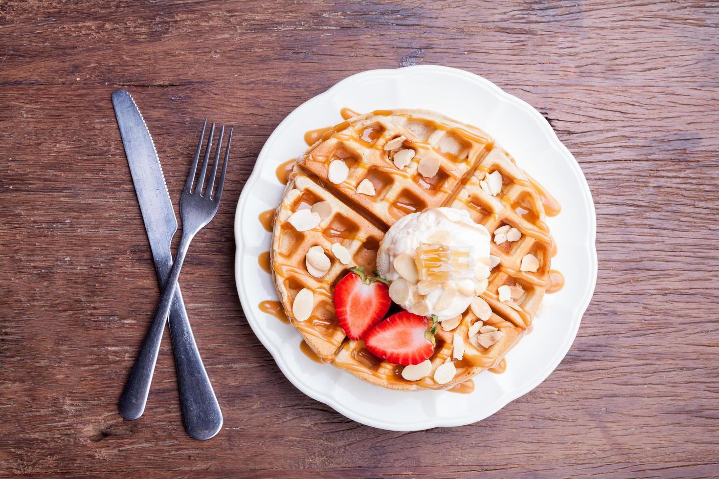 waffles with strawberries and ice cream photo