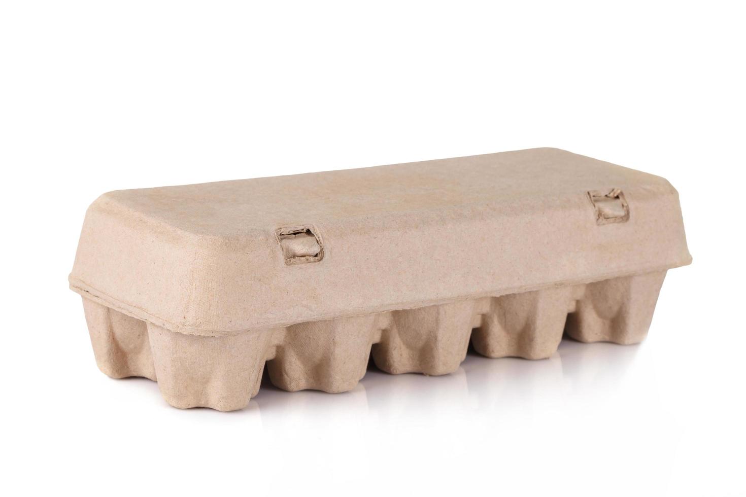 eggs in an egg carton on a white background photo