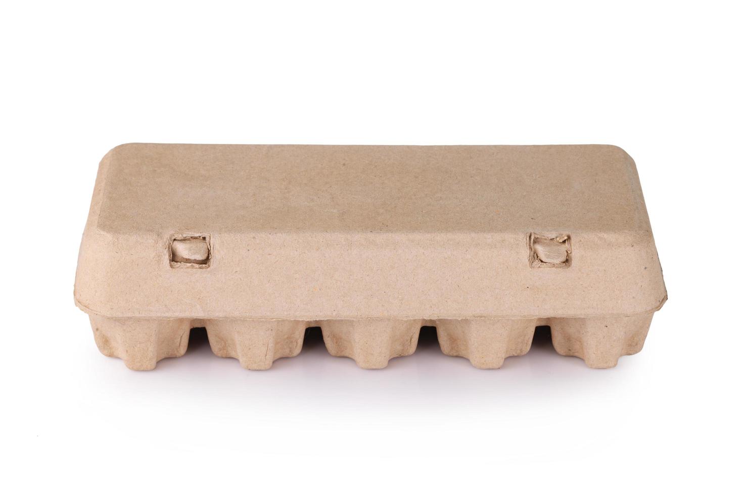eggs in an egg carton on a white background photo