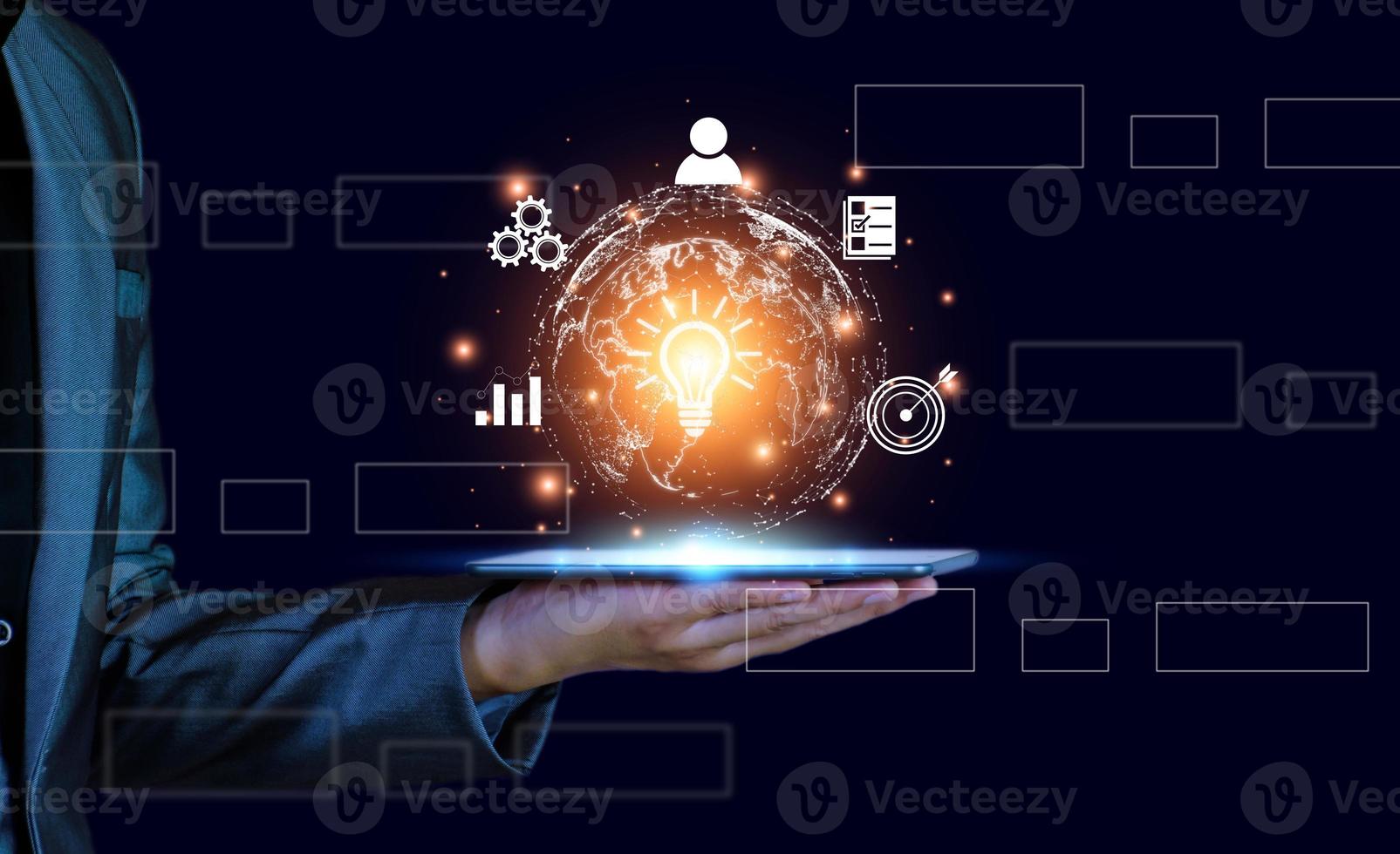 Businessman conducting online transactions with internet technology. Concept global data connection by metaverse technology , big data , search for information, e-commerce, online business.On tablet. photo