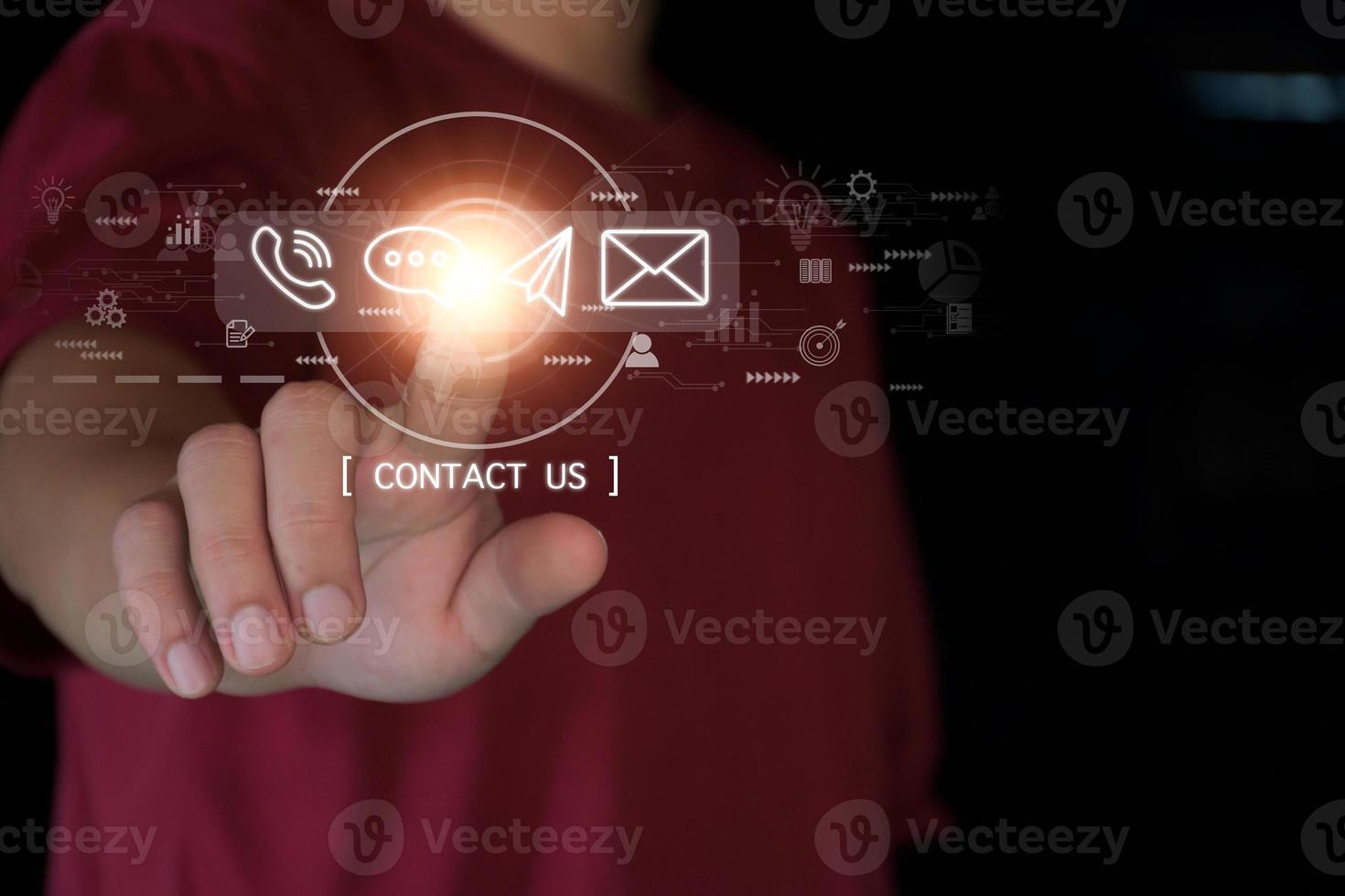 Concept Contact us or connected customer support hotline. businessman touching icon to communicate on a virtual screen,through a digital, global network. photo