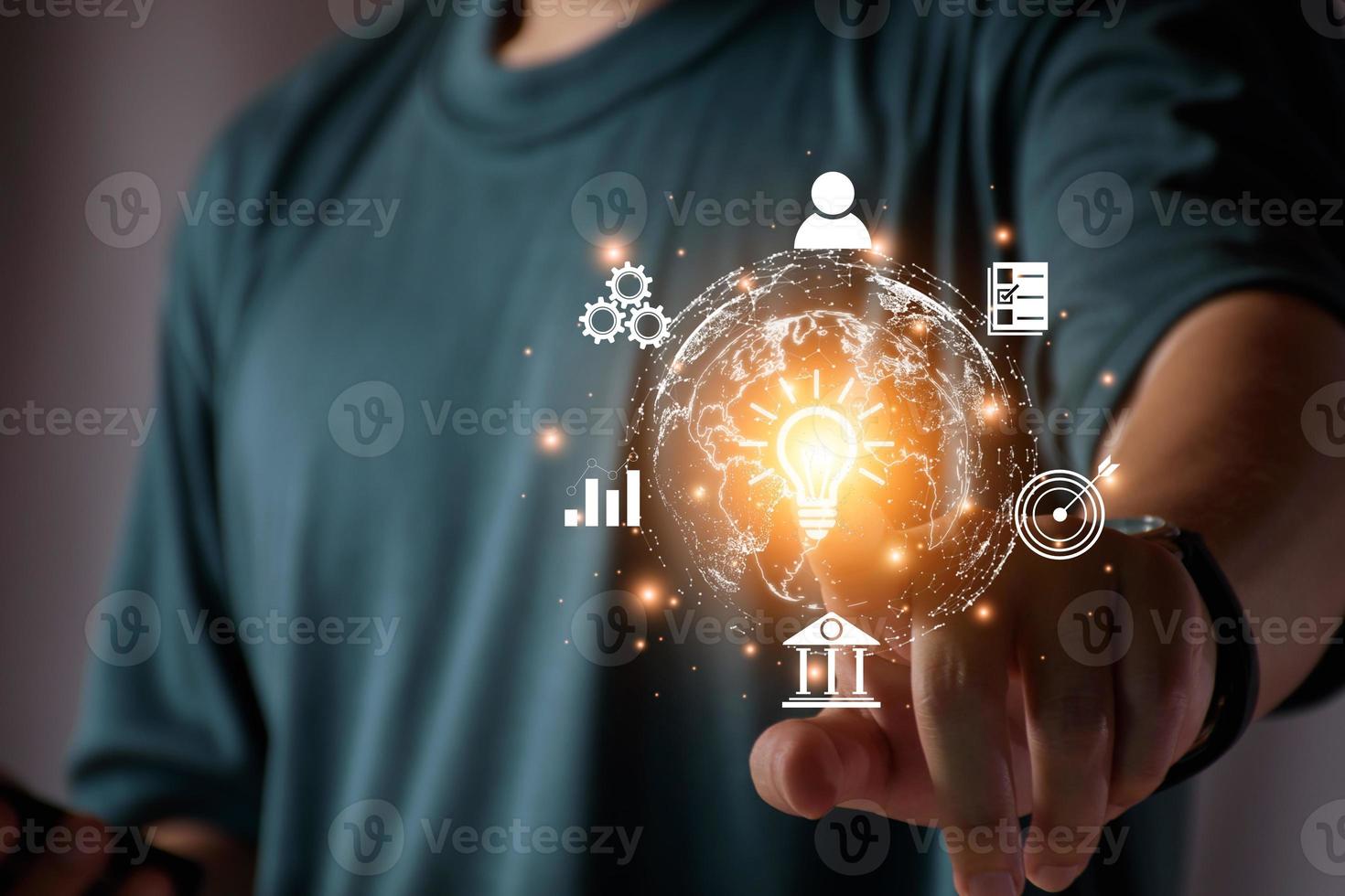 Businessman conducting online transactions with internet technology. Concept global data connection by metaverse technology , big data , search for information, e-commerce, online business. photo