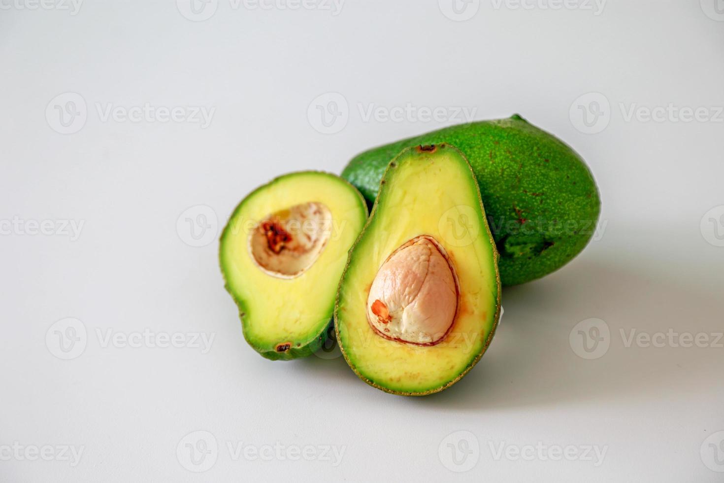 Ripe avocado on white background. photo