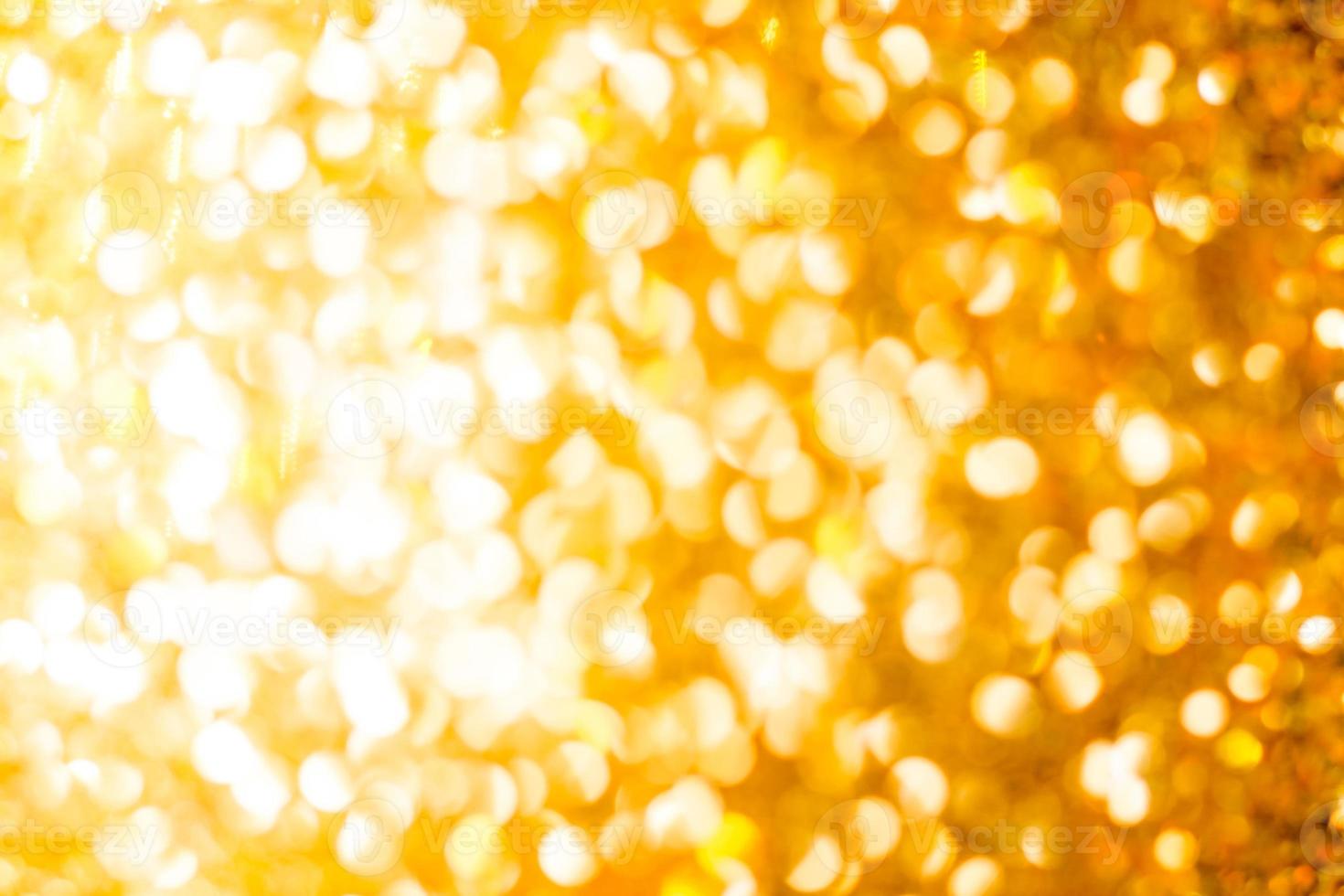 Bokeh Golden shiny glitter texture background. Happy new year and Christmas background. photo