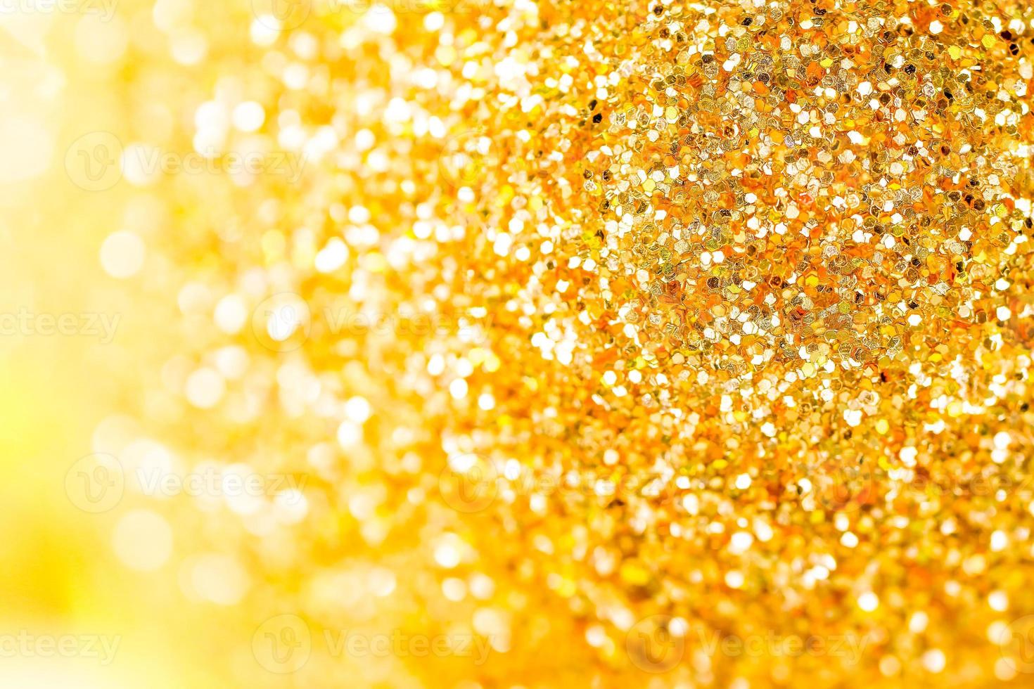 Golden shiny glitter texture background. Happy new year and Christmas background. photo