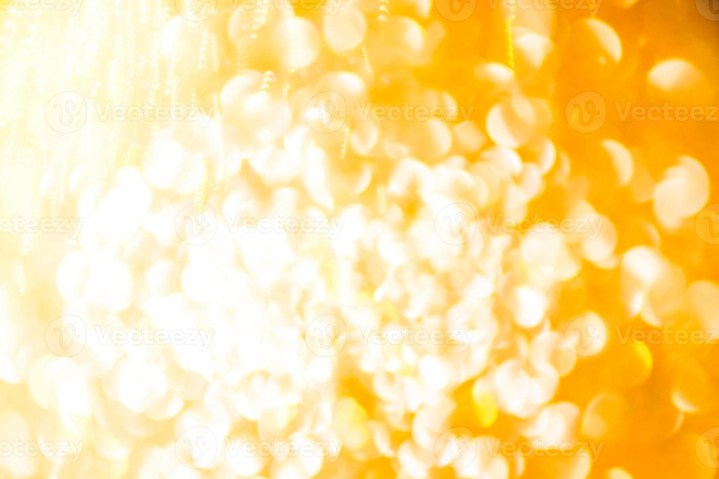 Bokeh Golden shiny glitter texture background. Happy new year and Christmas background. photo