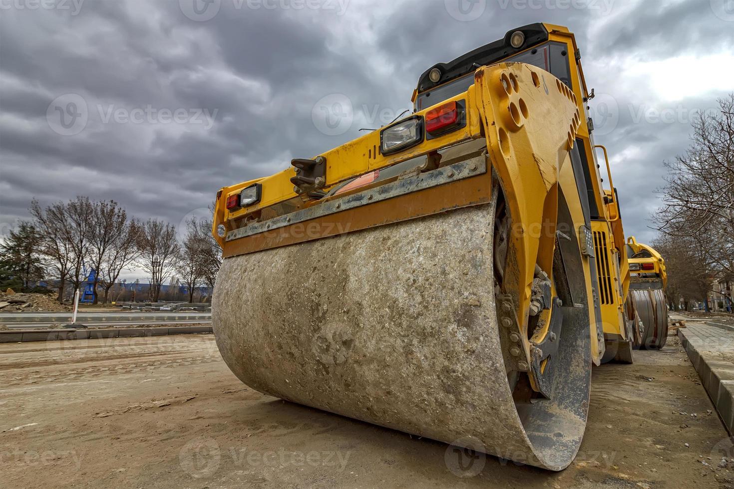 Close view of drum roller at a construction site photo