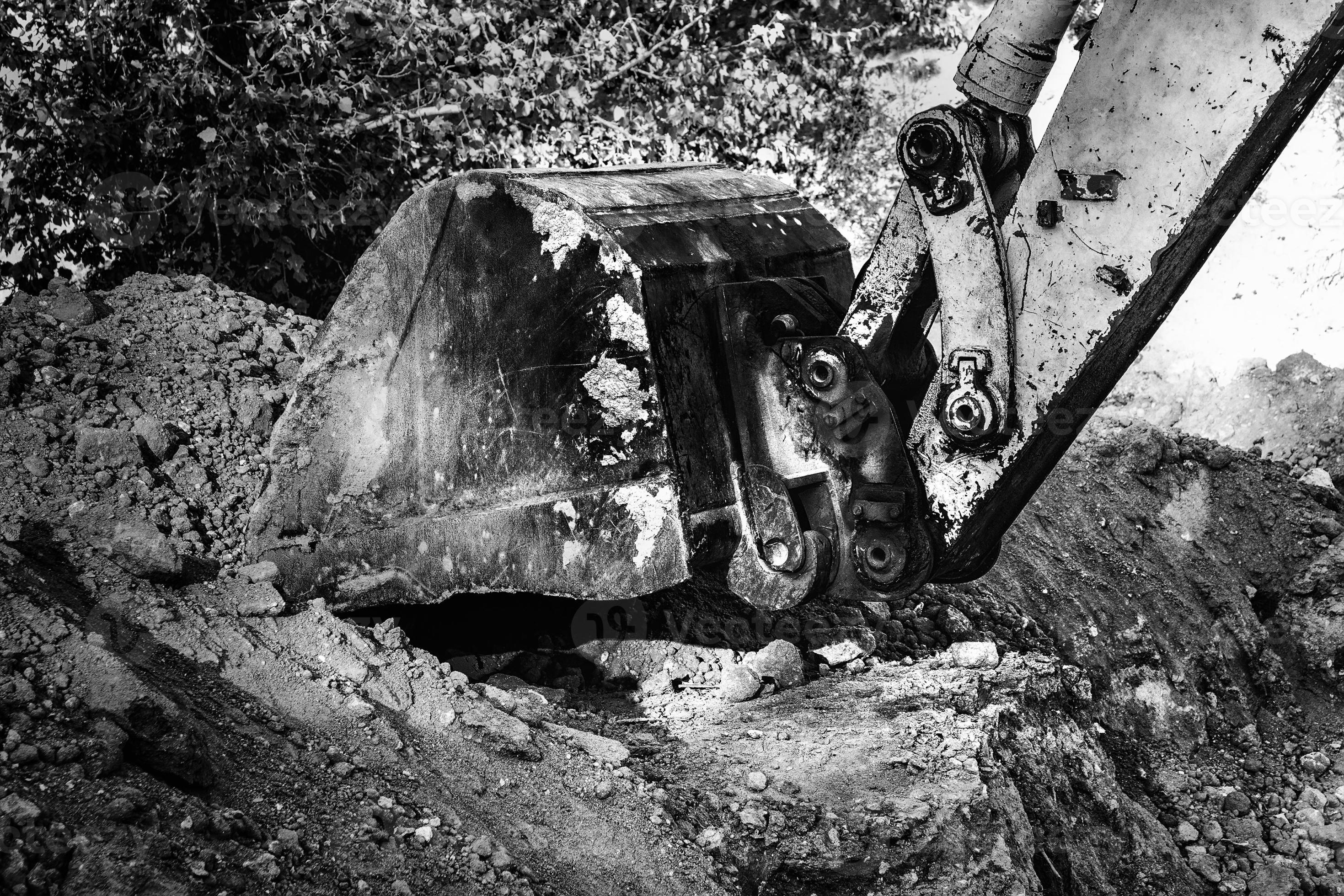 Industrial background. Digger bucket closeup. Construction excavator