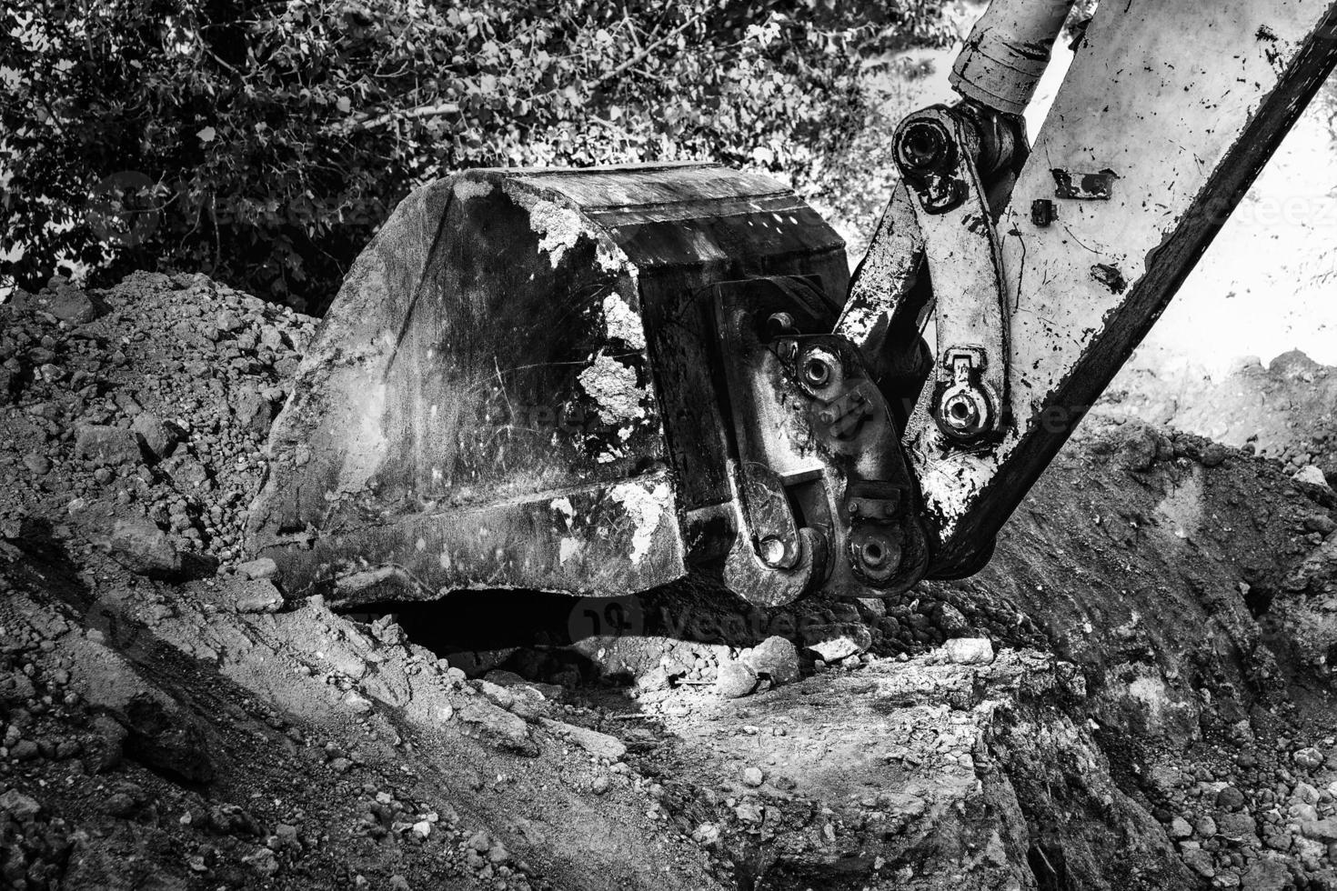 Industrial background. Digger bucket close-up. Construction excavator bucket. photo