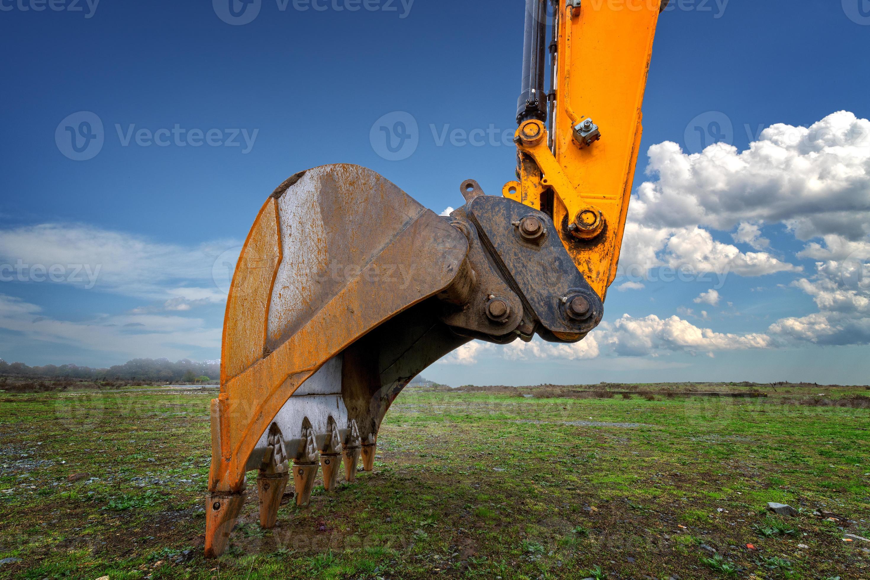 Industrial background. Digger bucket closeup. Construction excavator